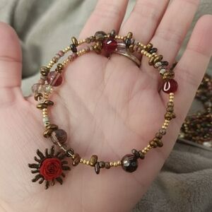 Elegant Beaded Bracelet with Rose Charm